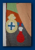 A detail from the  C of I banner